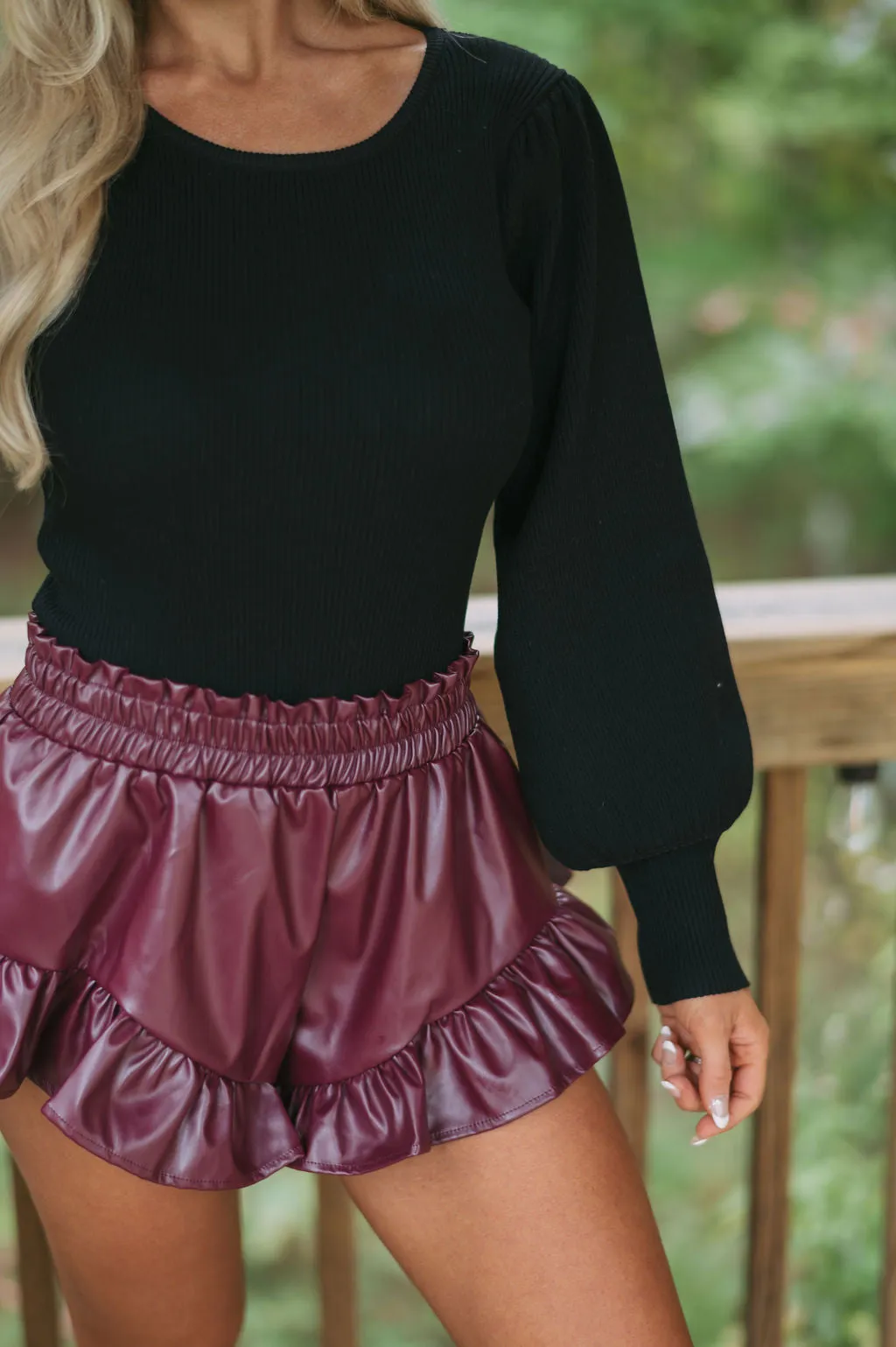 Ruffled Hem Faux Leather Shorts