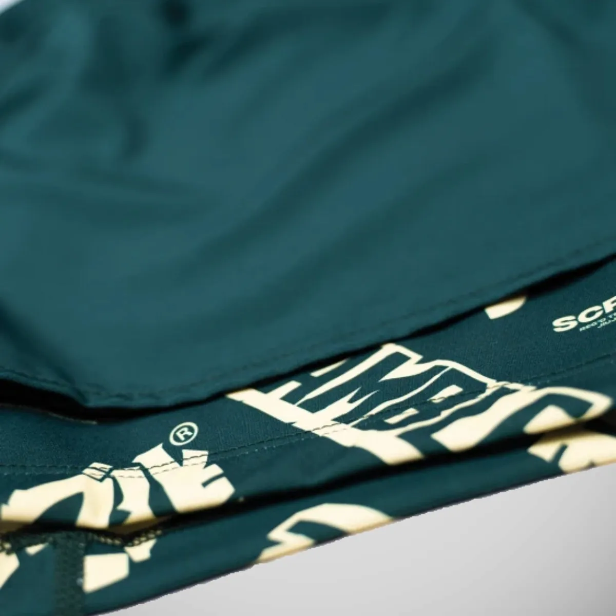 Scramble Logotype Combination Shorts Green